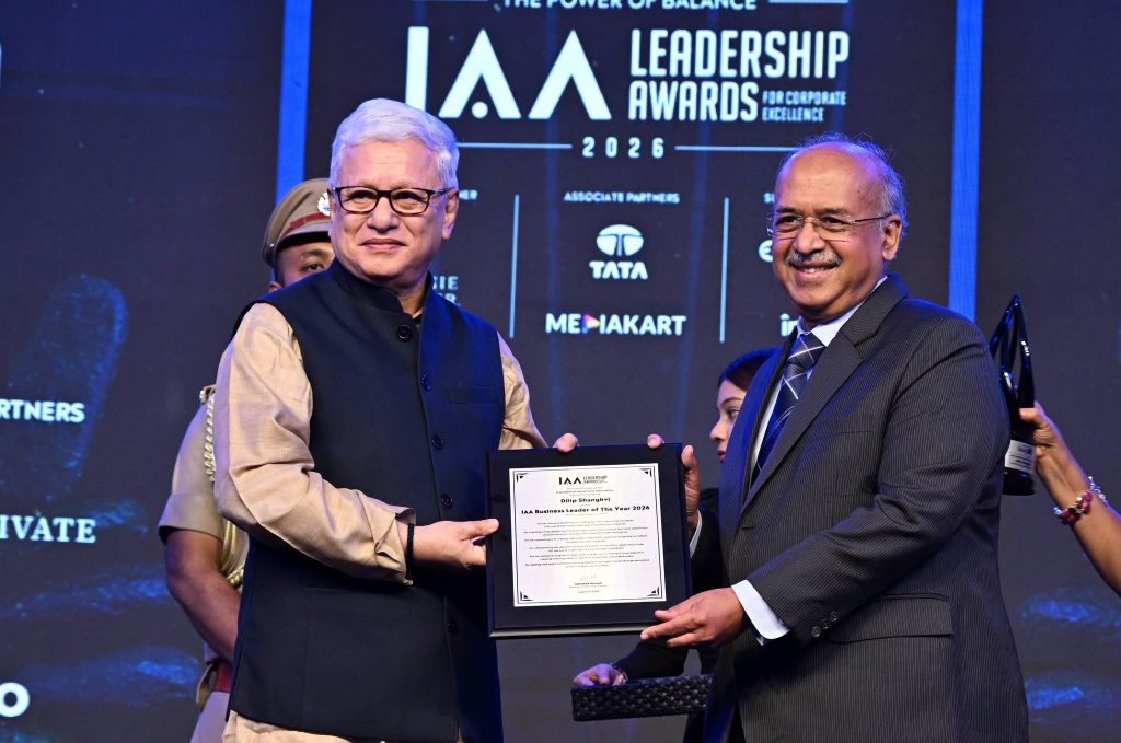 Dilip Shanghvi receiving the IAA Business Leader of the Year award on stage at the IAA Leadership Awards 2026.